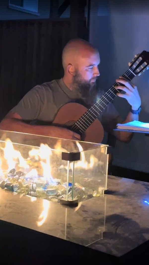 Solo classical guitar for events performer playing at an event | Altus Entertainment